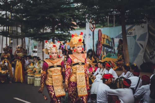 Free Women in traditional costumes participating in a festival parade in Batam, Indonesia. Stock Photo