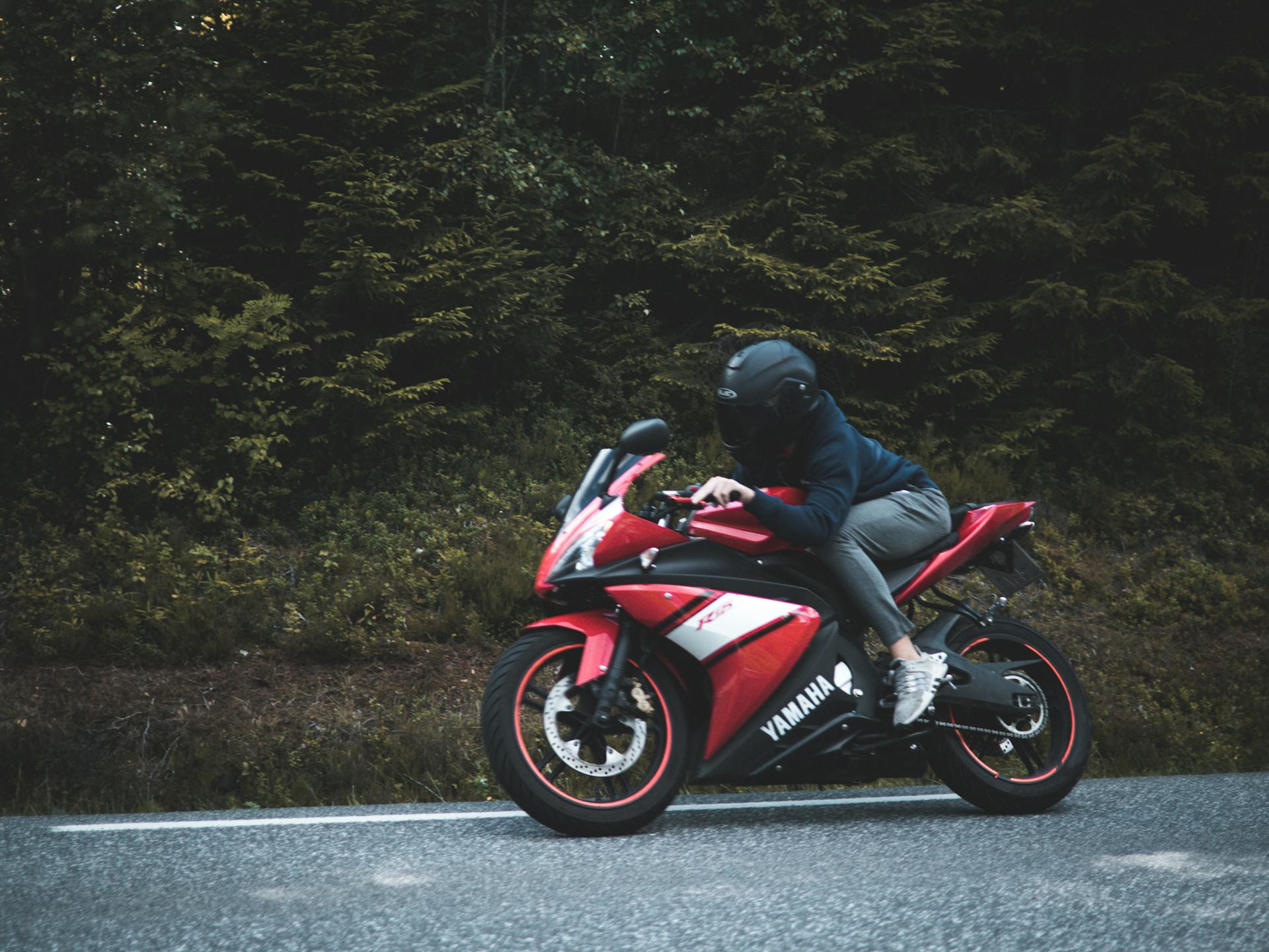 Person Riding on Sports Bike