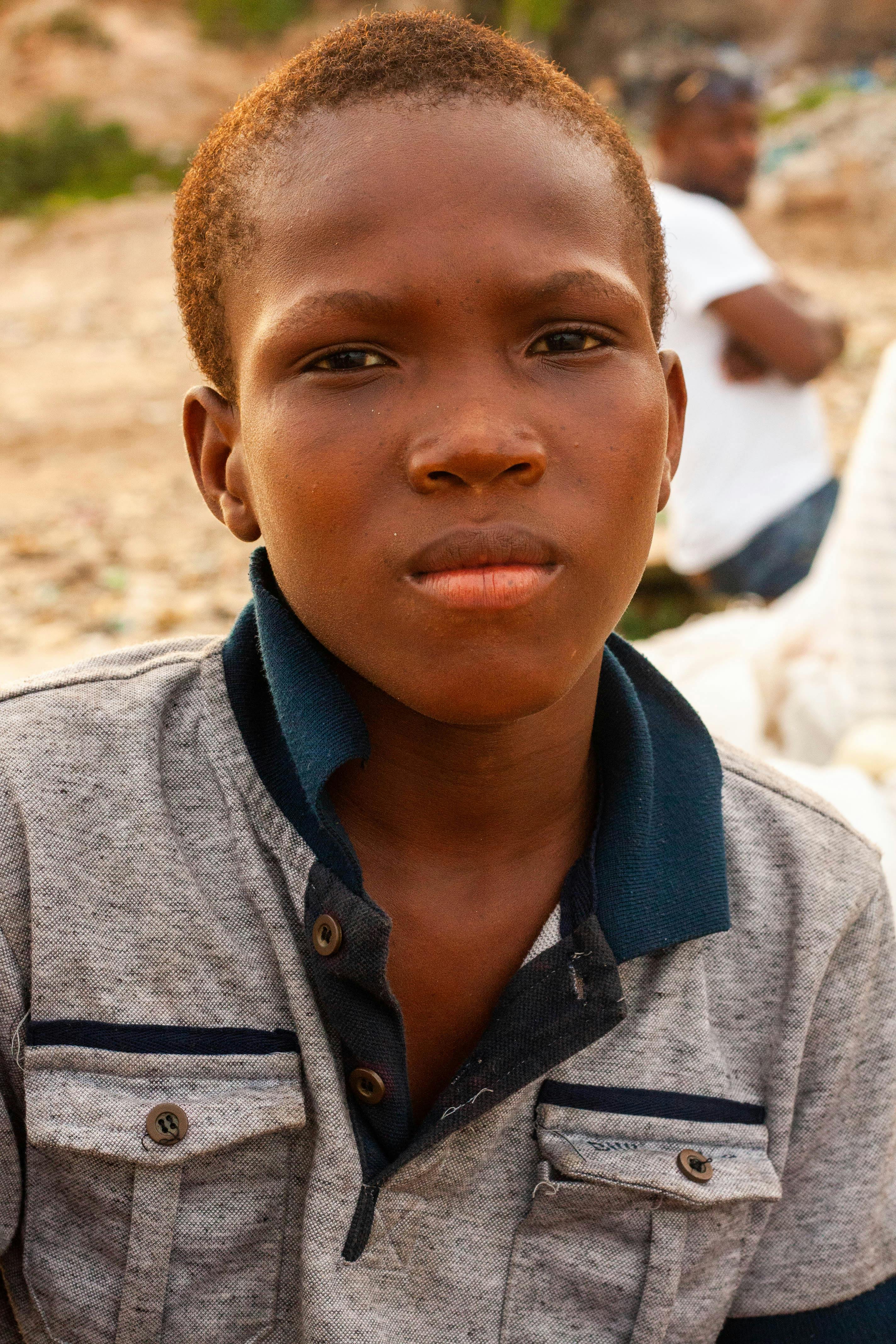 portrait of a boy in a polo shirt