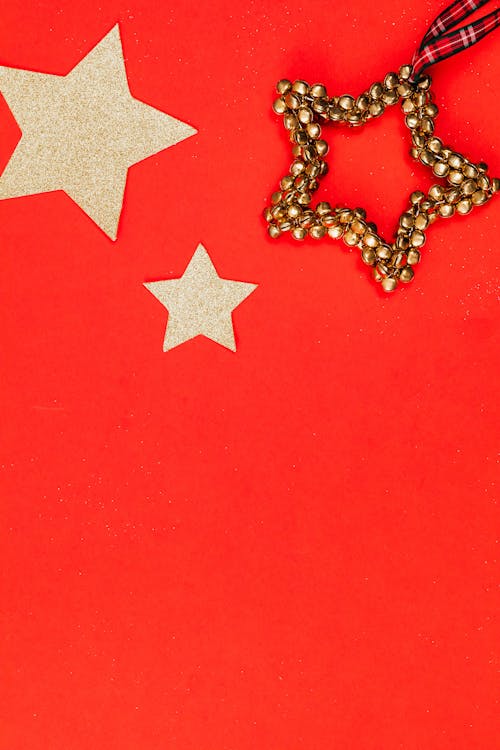 Close Up of Christmas Ornaments on Red Background