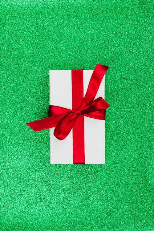 A Present on a Green Surface 
