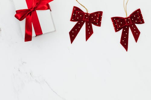 Free Christmas Gift and Red Ribbons Stock Photo