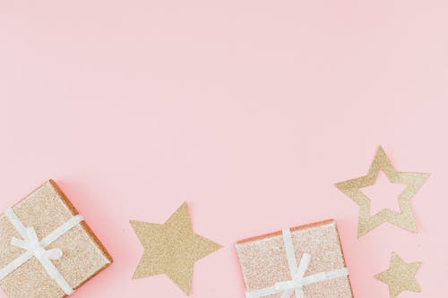 Free Photograph of Gold Stars on a Pink Surface Stock Photo