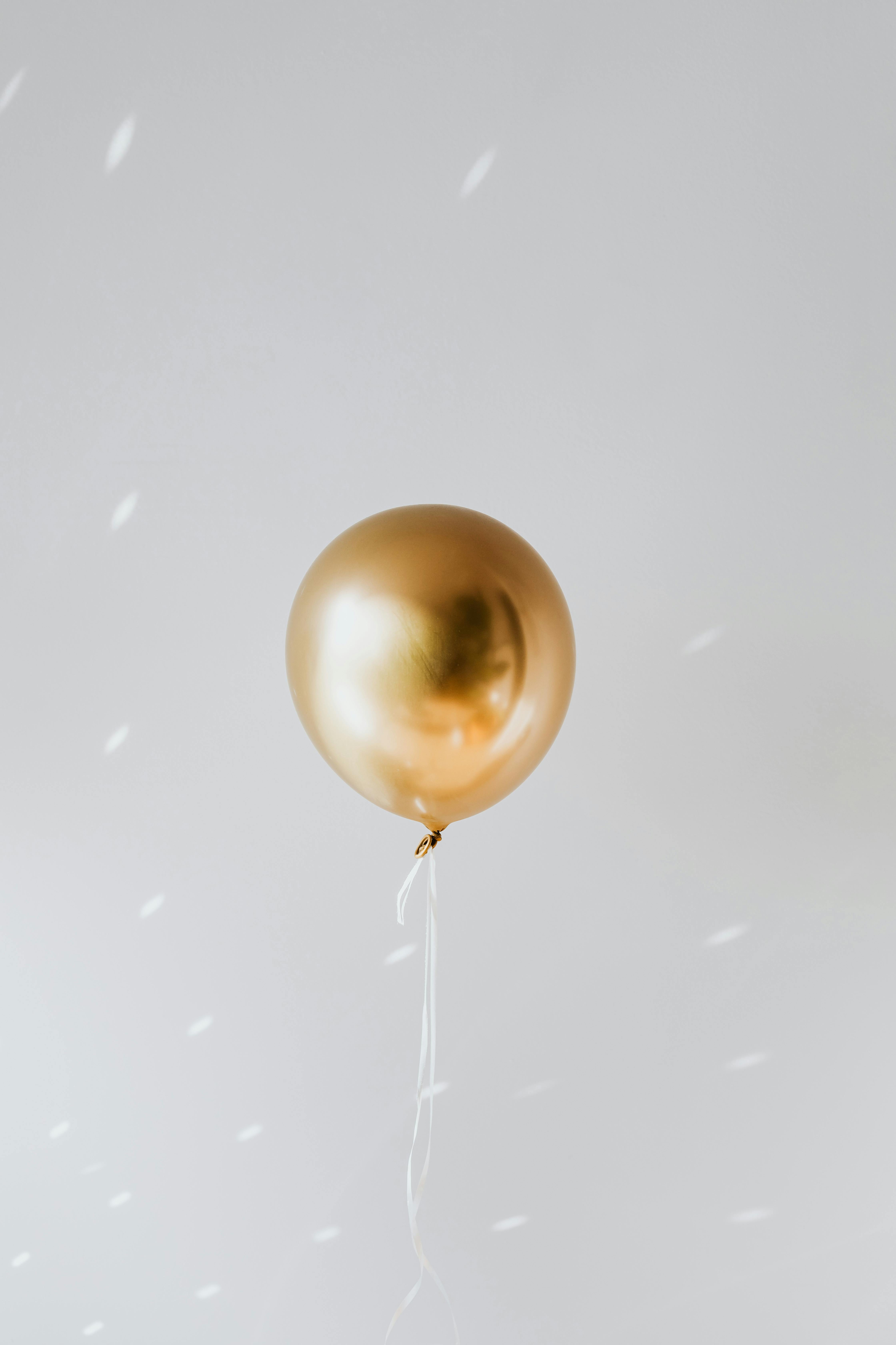 close up shot of a gold balloon