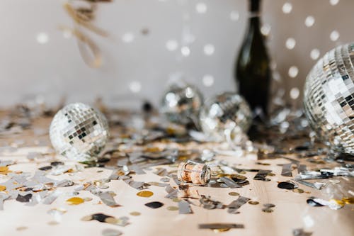 Free Glitters and Disco Balls on Floor after Party Stock Photo