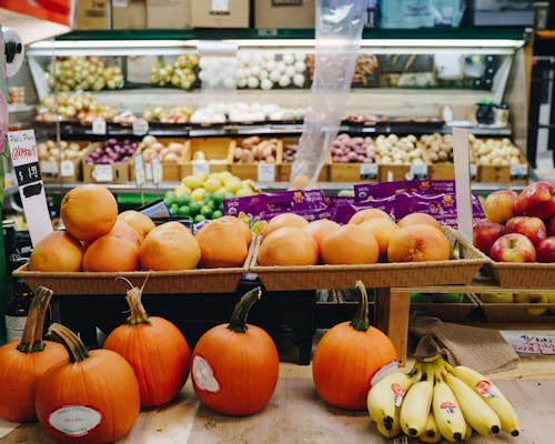 Free Vegetables and Fruits on Display in Grocery Stock Photo