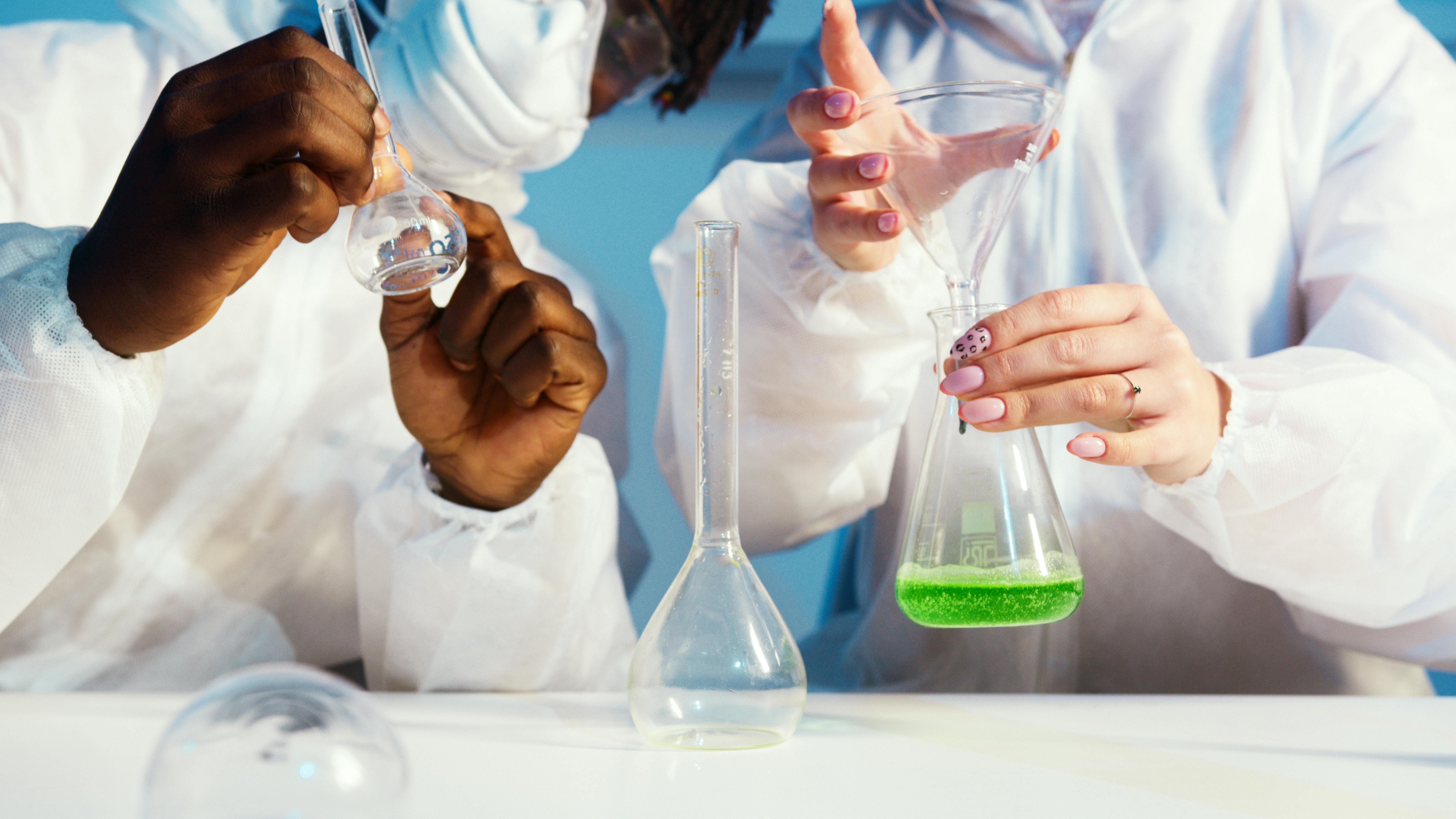 a man and a woman doing an experiment