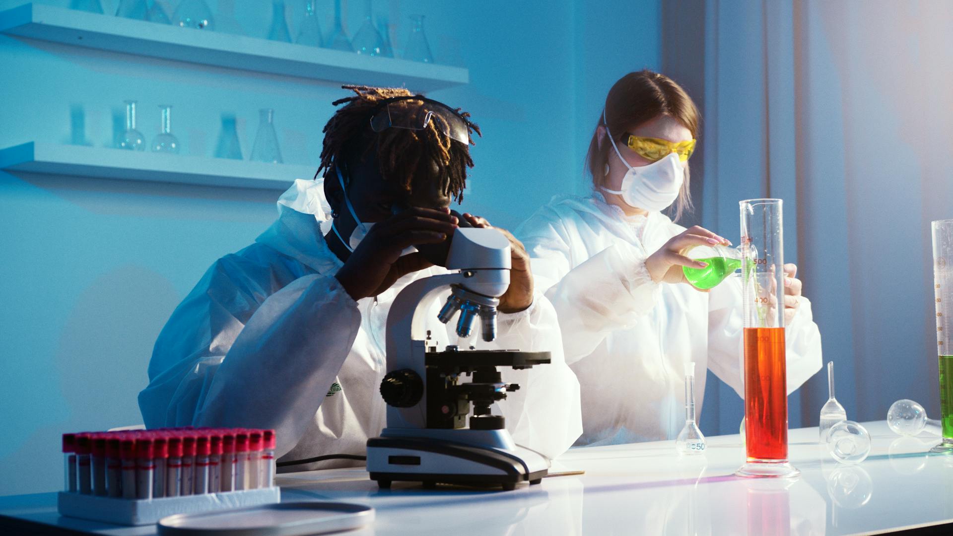 A Man and a Woman Doing an Experiment