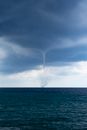 Waterspout Forming Over The Horizon