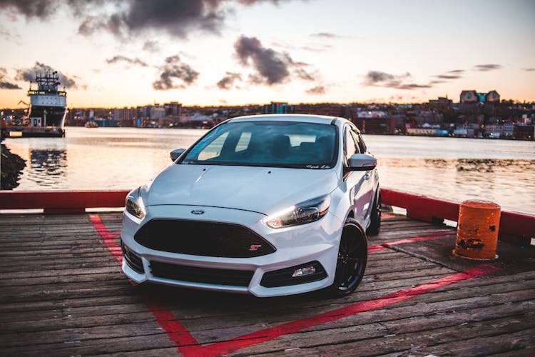 Stylish Luxury Car Parked On Pier