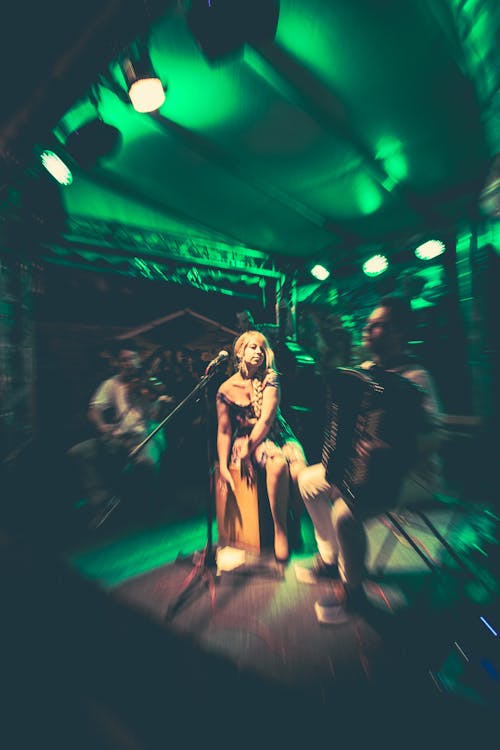 Free stock photo of concert, female, green