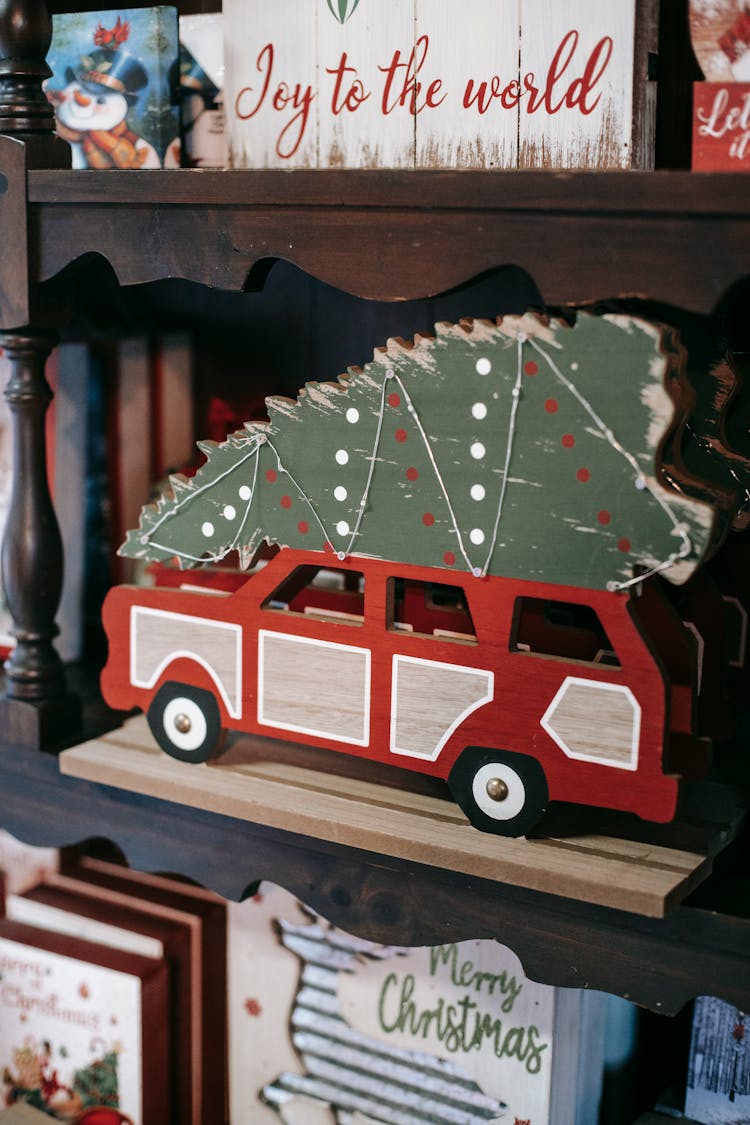 Decorative Christmas Vehicle With Fir Tree On Shelf