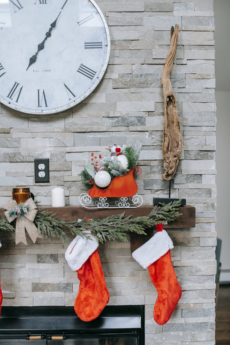 Clock On Wall Above Christmas Decor During Festive Event