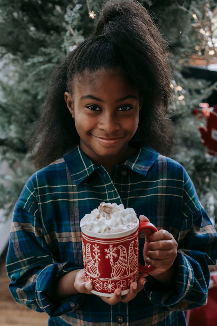 Smiling Black Child With Hot Coffee With Cream