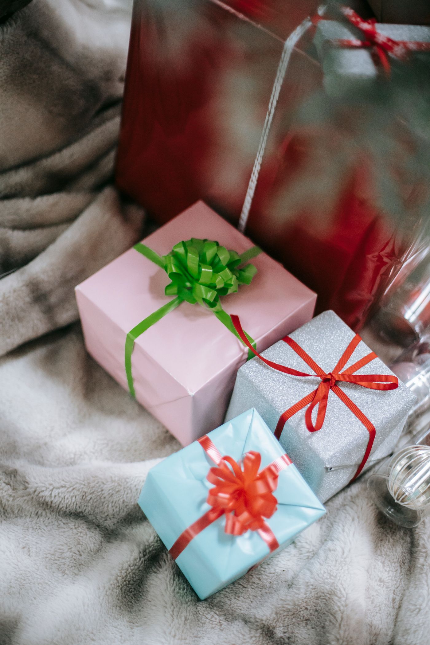Christmas presents wrapped in paper and tied with ribbon