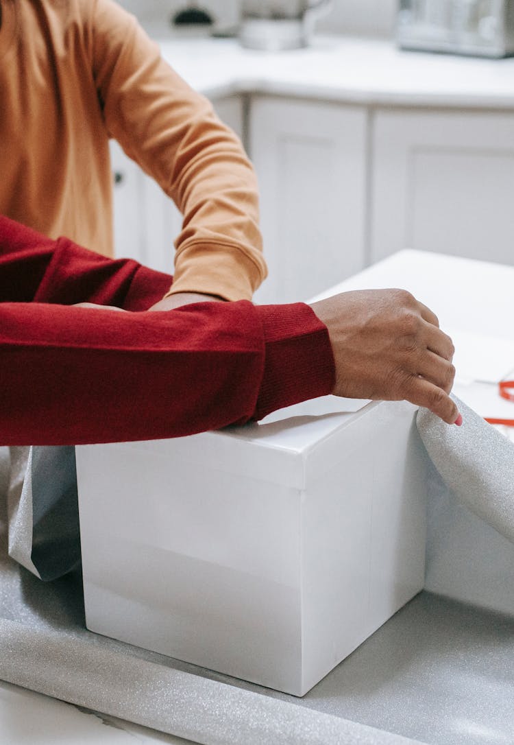 Black Woman And Child Packing Box With Present