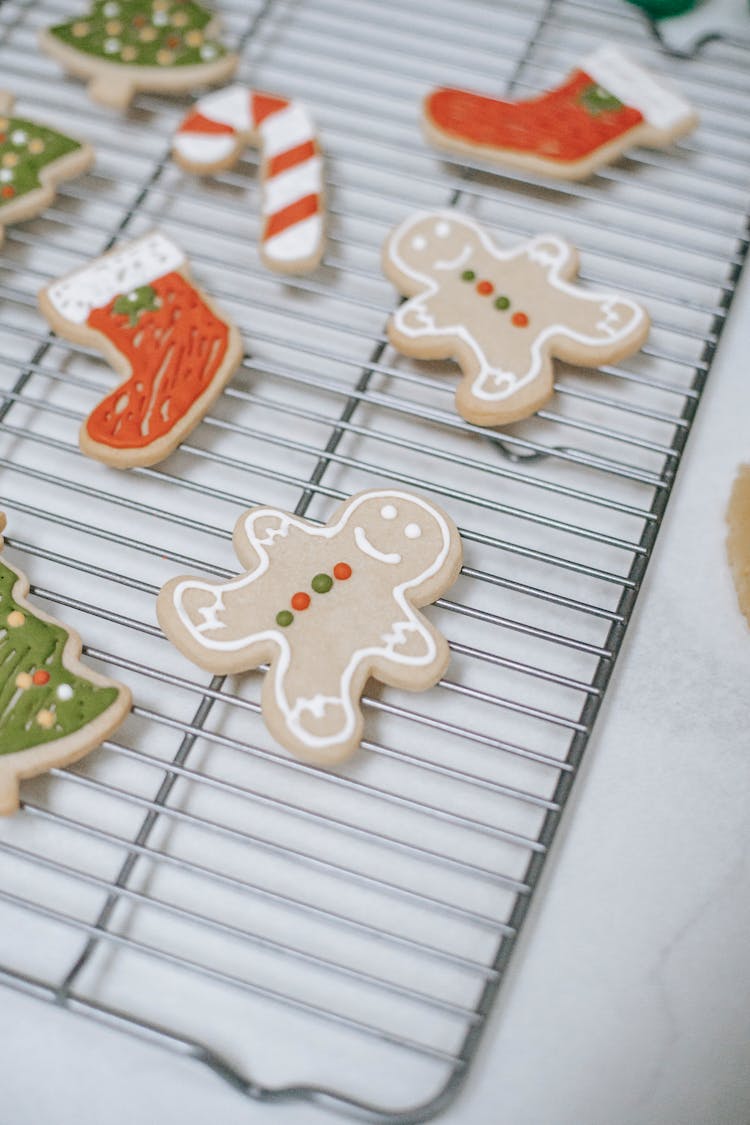 Different Christmas Biscuits On Cooling Rack During Festive Event