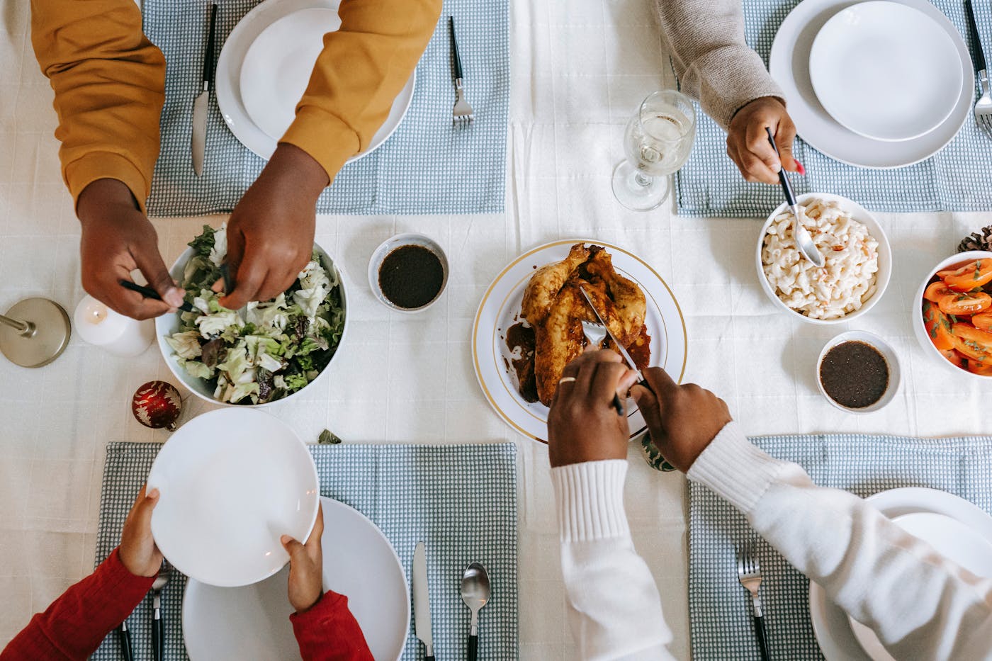 Diverse group sharing food at the table