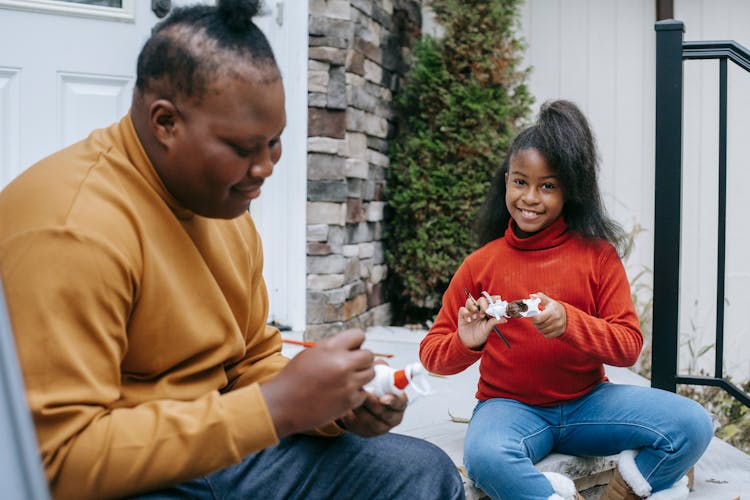 Black Boy And Girl Painting Christmas Toys