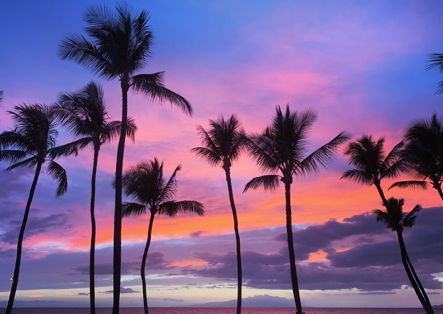 West Maui coastline glowing at sunset