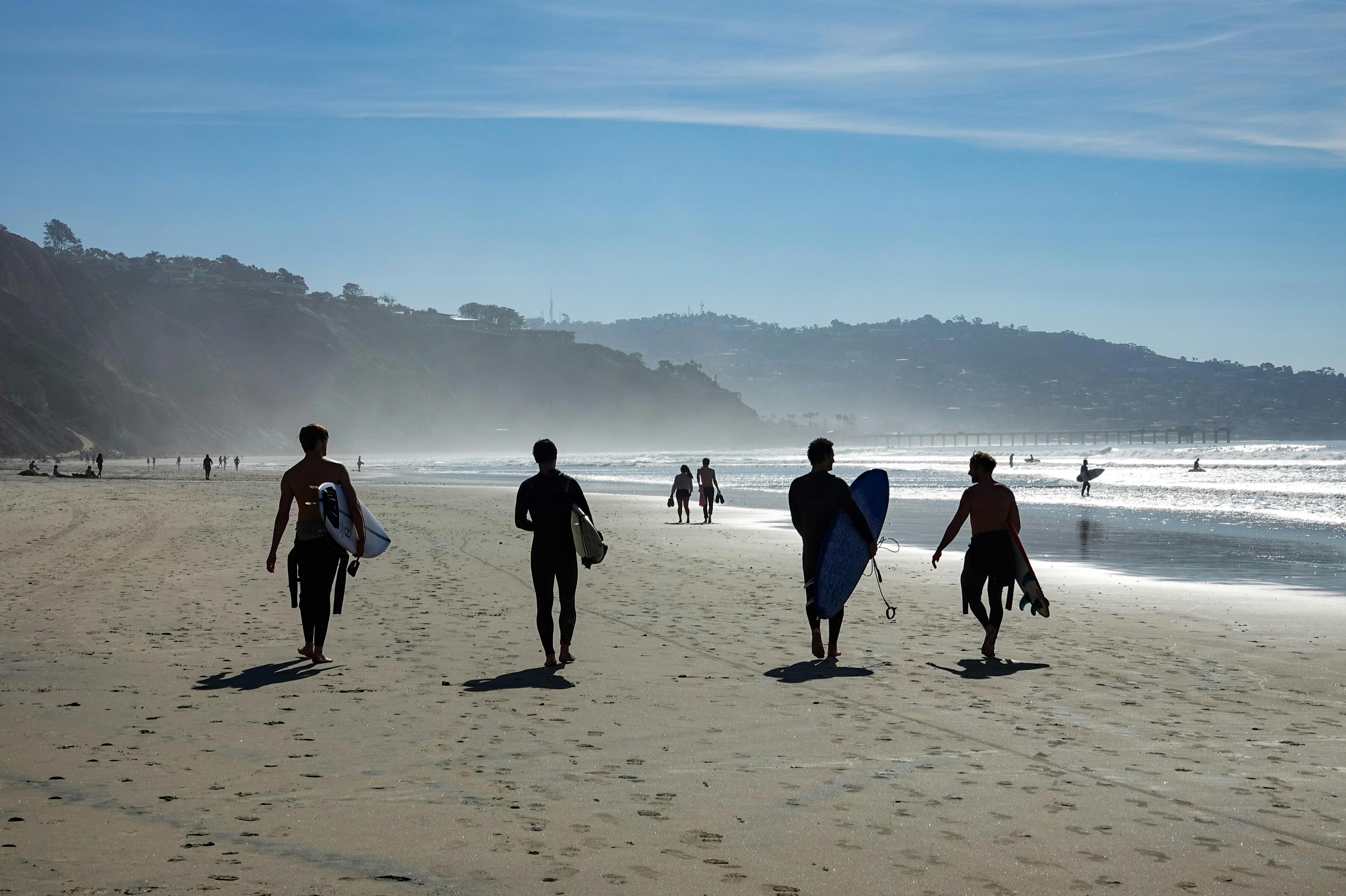 People on Beach by Blue Tent · Free Stock Photo