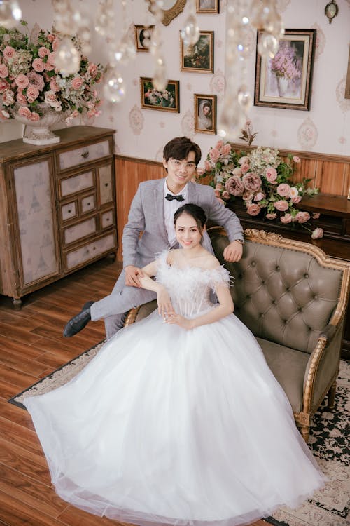 Bride and Groom Smiling and Posing for a Wedding Photo 