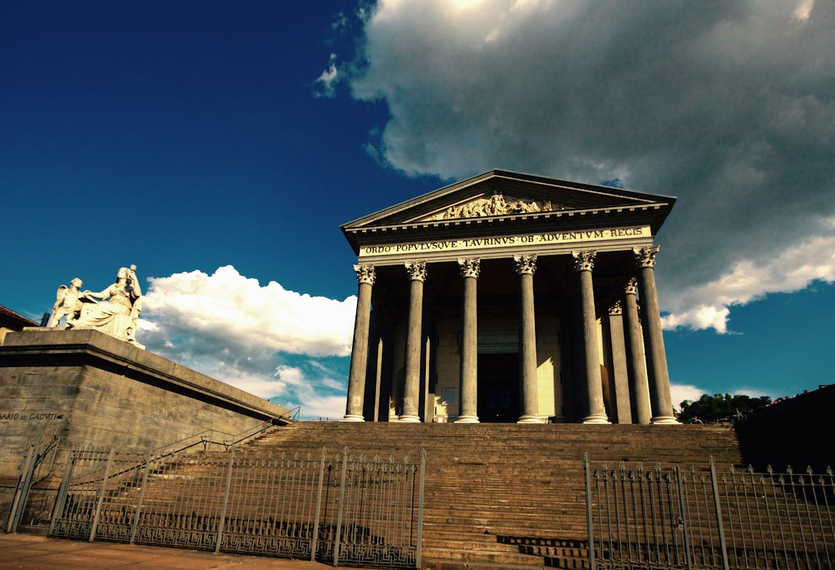 Friends sharing a colorful snack board at a table with drinks