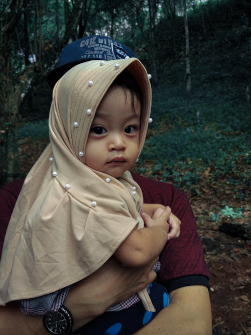 Free stock photo of asian kid, baby girl, dark and moody