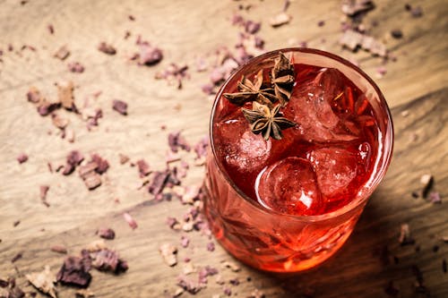 Free stock photo of anise, artificial flowers, cocktail