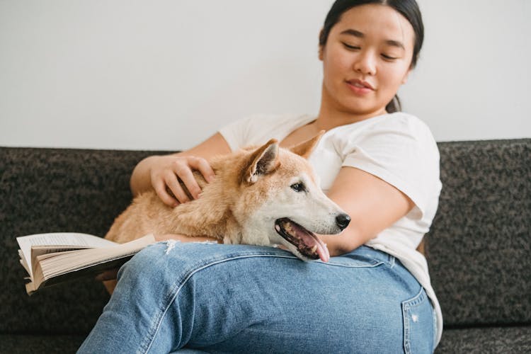 Smiling Asian Woman With Faithful Shiba Inu