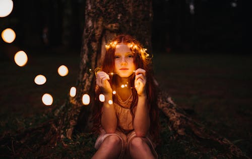 Free Girl Holding String Lights Stock Photo