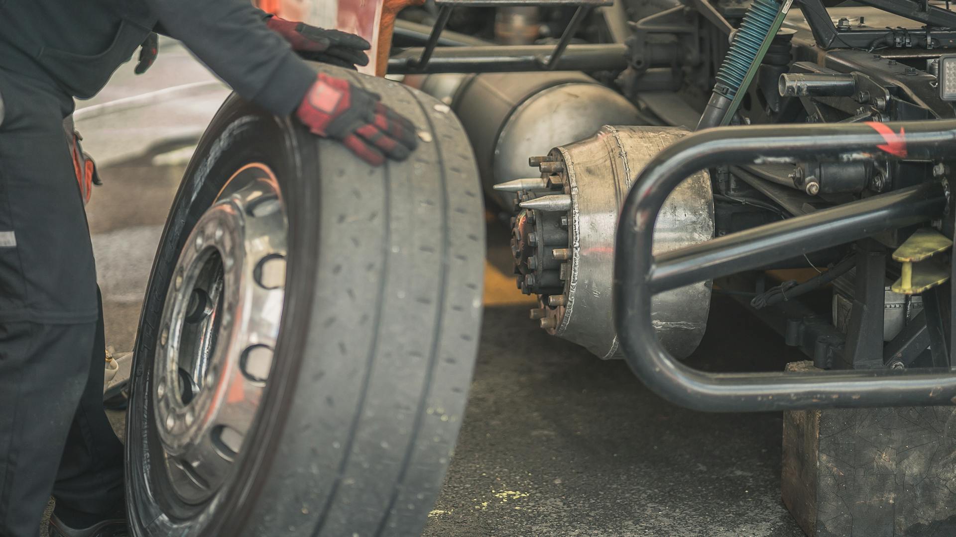 A Person Holding a Tire
