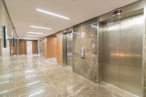 Free Corridor of modern building with elevators Stock Photo