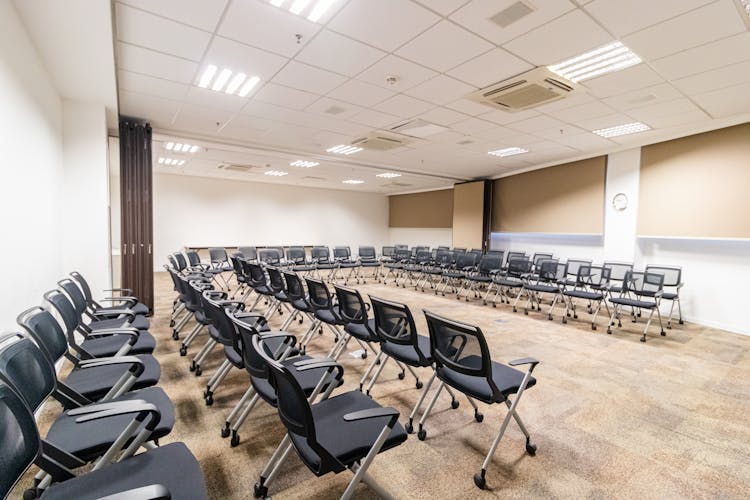 Empty Seats In Conference Room In Office Center