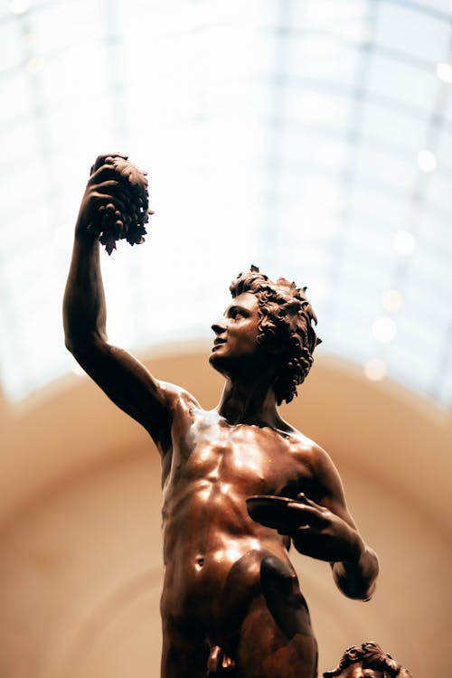 Free A Topless Man Statue Stock Photo