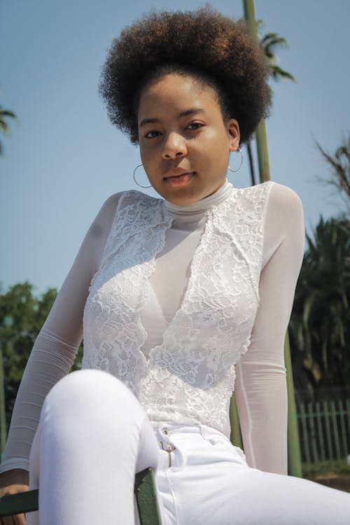 Woman in White Long Sleeves and Lace Clothing