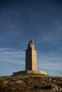 Brown Concrete Tower Under Blue Sky