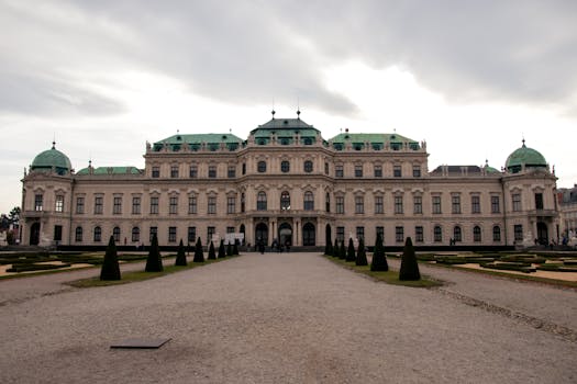 Explore the majestic architecture of Upper Belvedere Palace in Vienna, Austria, showcasing its grand facade.