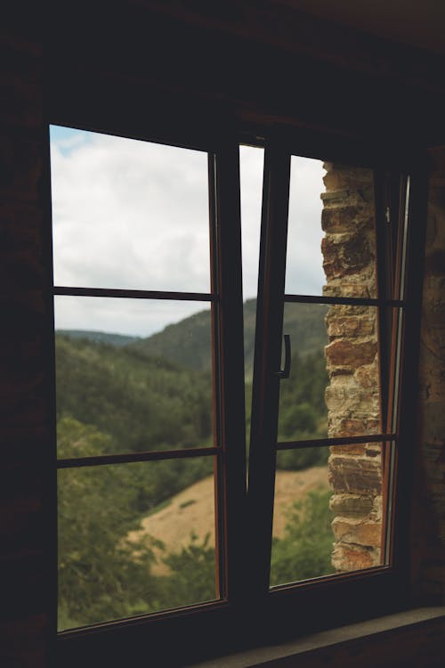 Free A Brown Wooden Framed Glass Window Stock Photo