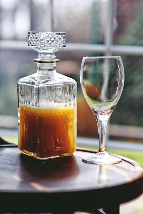 Banana juice in carafe & empty glass