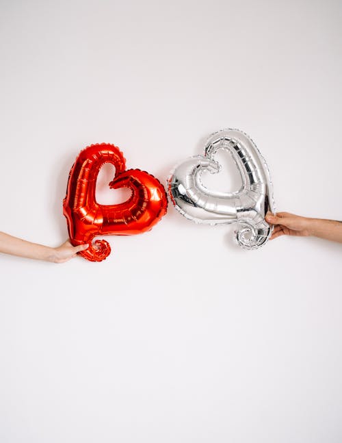Free Red and Silver Heart Balloons Stock Photo