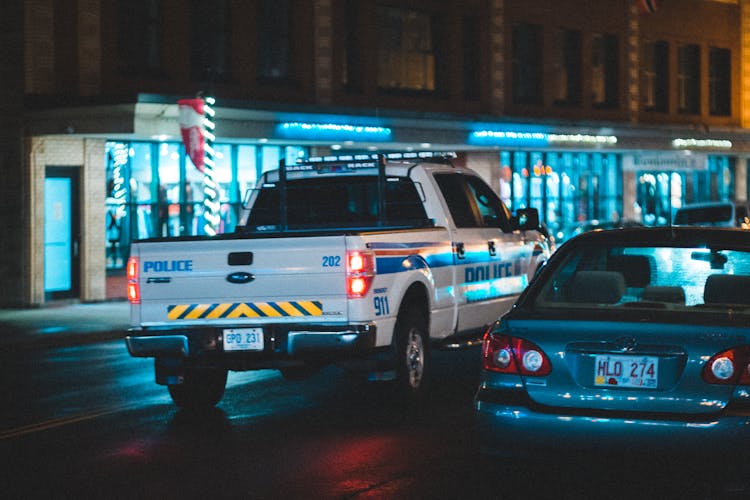 Police Car Driving On Road