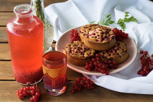 Plate of Cookies With Chocolate Dips and Glass of Juice