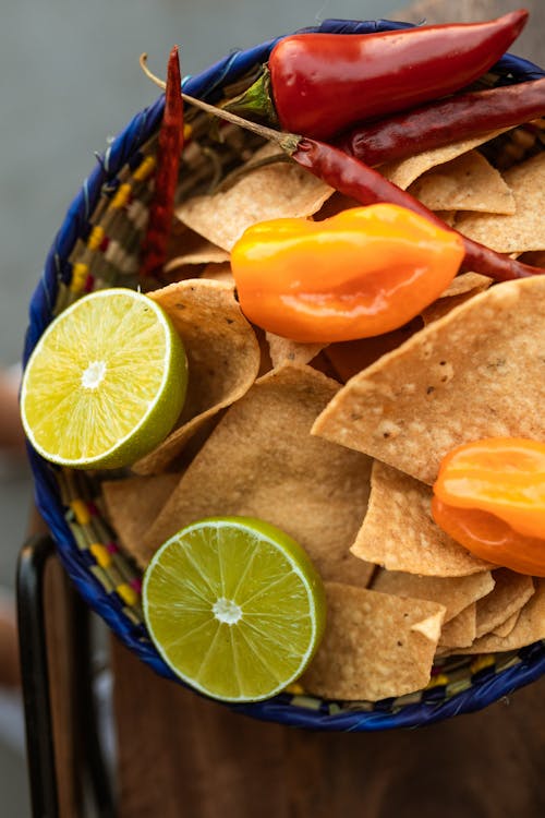 Free Brown Chips on Blue Basket Stock Photo