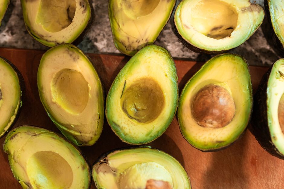 ripe avocado on wood table