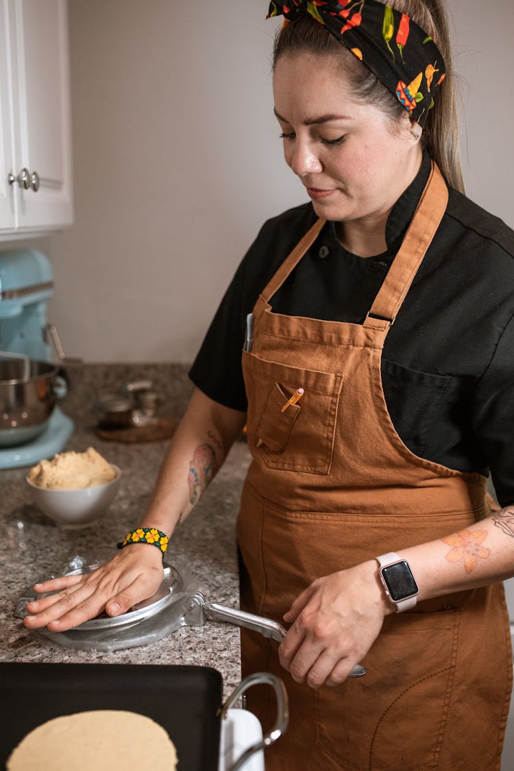 A Female Chef Making Tortilla