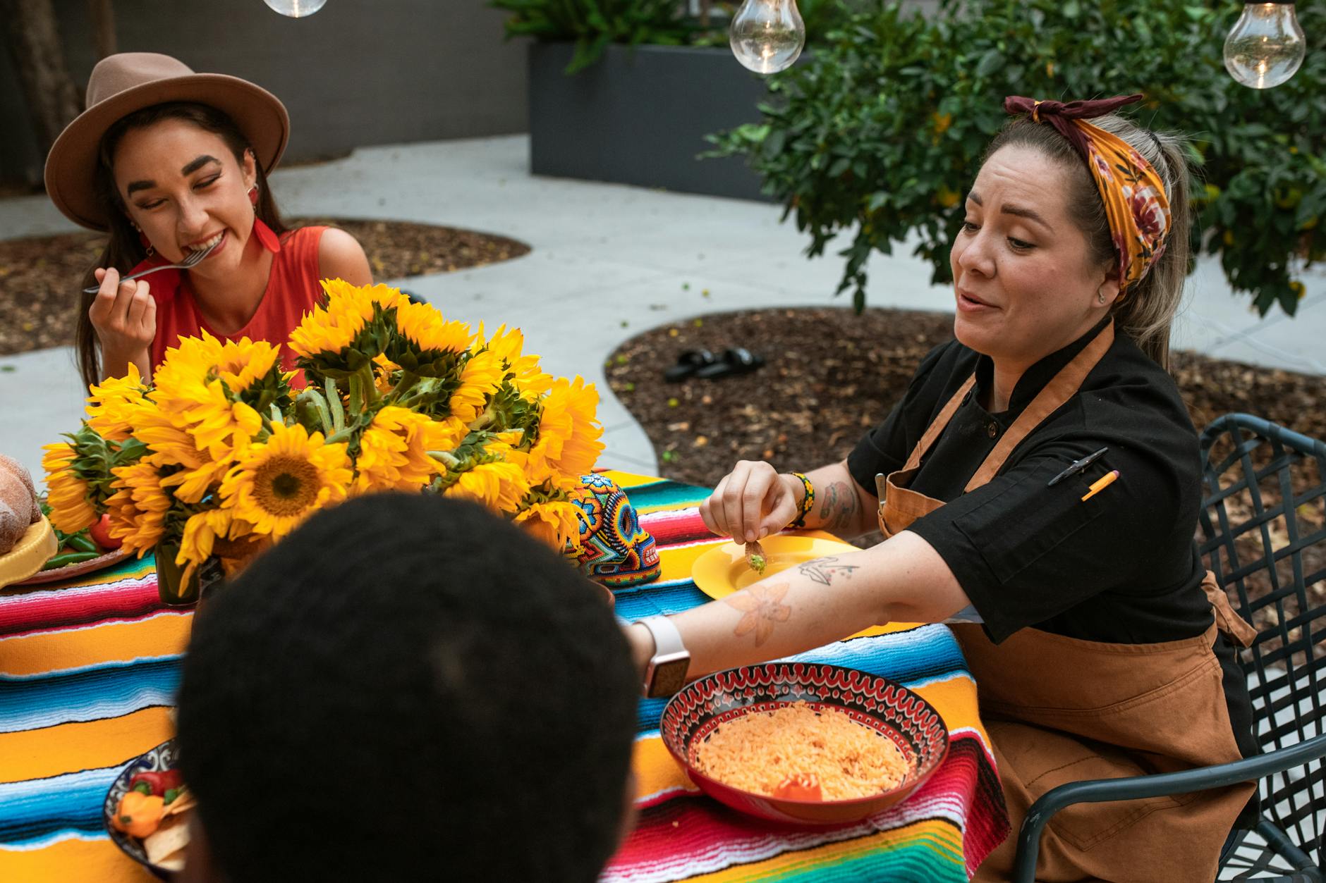 Women Sitting Near the Table while Having Conversation