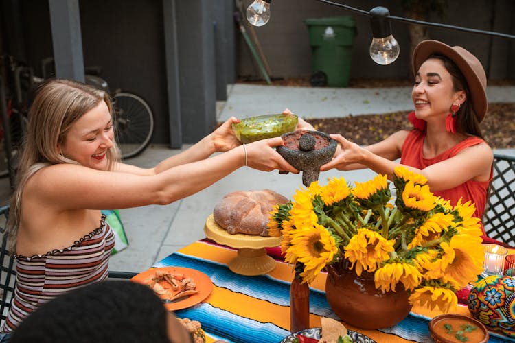 People Eating At A Table 