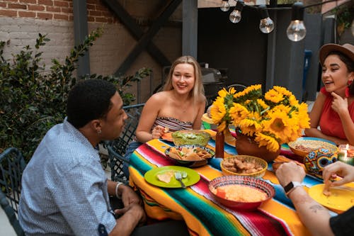 Free Friends Sitting at the Table Stock Photo