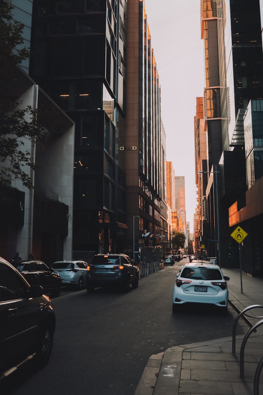 Cars Parked on Side of the Road in Between High Rise Buildings · Free Stock Photo Cars Parked on Side of the Road in Between High Rise Buildings · Free Stock Photo